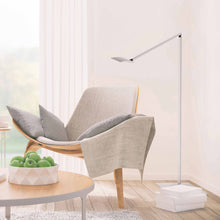 Load image into Gallery viewer, Mosso Pro LED Floor Lamp in living room.
