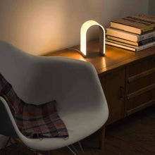 Load image into Gallery viewer, Mr. N LED Table Lamp in living room.
