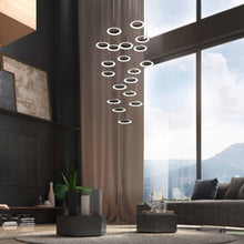Load image into Gallery viewer, Royyo LED Multi Light Pendant Light in living room.
