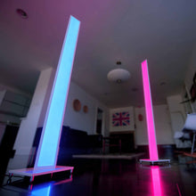 Load image into Gallery viewer, Tono Floor Lamp in living room.
