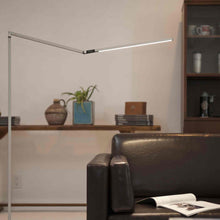 Load image into Gallery viewer, Z-Bar LED Floor Lamp in living room.
