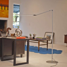 Load image into Gallery viewer, Z-Bar LED Floor Lamp in living room.

