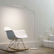 Load image into Gallery viewer, Z-Bar LED Floor Lamp in living room.
