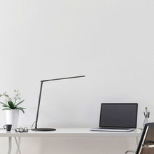 Load image into Gallery viewer, Z-Bar Solo LED Desk Lamp in office.
