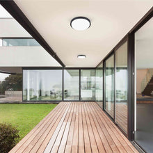 Load image into Gallery viewer, Bailey LED Flush Mount Ceiling Light Outside Area.
