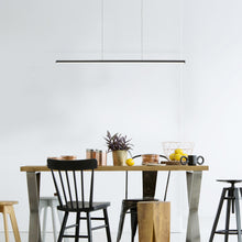 Load image into Gallery viewer, Chute LED Pendant Light in dining room.
