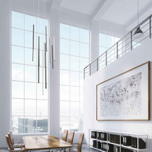 Load image into Gallery viewer, Chute Round LED Pendant Light in office.
