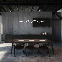 Load image into Gallery viewer, Cursive LED Linear Pendant Light in dining room.
