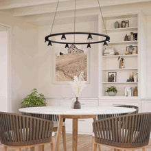 Load image into Gallery viewer, Dune LED Chandelier in living room.
