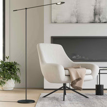 Load image into Gallery viewer, Rotaire LED Floor Lamp in living room.
