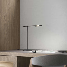 Load image into Gallery viewer, Rotaire LED Table Lamp in living room.
