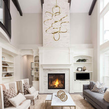 Load image into Gallery viewer, Synergy Vertical LED Pendant Light in living room.
