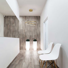 Load image into Gallery viewer, Twist LED Pendant Light in office.
