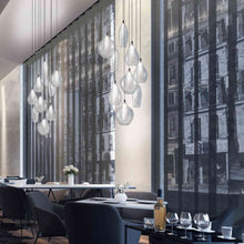Load image into Gallery viewer, Victoria LED Multi Light Pendant Light in restaurant.
