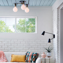 Load image into Gallery viewer, Bobbie Flush Mount Ceiling Light in living room.
