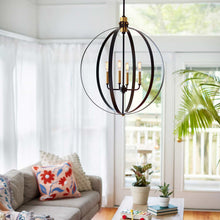 Load image into Gallery viewer, Cirque Chandelier in living room.
