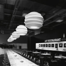 Load image into Gallery viewer, Le Soleil Pendant Light in dining room.
