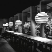 Load image into Gallery viewer, Le Soleil Pendant Light in dining room.
