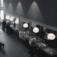 Load image into Gallery viewer, Le Soleil Pendant Light in dining room.
