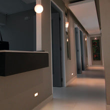 Load image into Gallery viewer, LEDme Horizontal LED Trimless Step and Wall Light in outside area.
