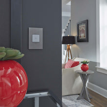 Load image into Gallery viewer, adorne® Cast Metals PLUS 1-Gang Wall Plate in living room.
