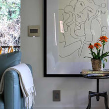 Load image into Gallery viewer, adorne® Cast Metals PLUS 1-Gang Wall Plate in living room.
