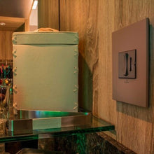 Load image into Gallery viewer, adorne® Cast Metals Wall Plate in living room.
