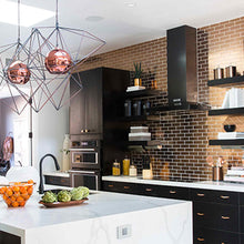 Load image into Gallery viewer, adorne® Cast Metals Wall Plate in kitchen.
