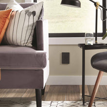 Load image into Gallery viewer, adorne® Full-Size, A/A USB Outlet in living room.
