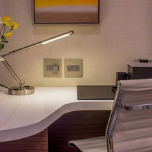 Load image into Gallery viewer, adorne® Half-Size Outlet in home office.
