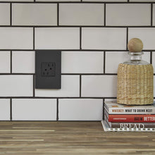 Load image into Gallery viewer, adorne® Tamper-Resistant Outlet in livingroom.
