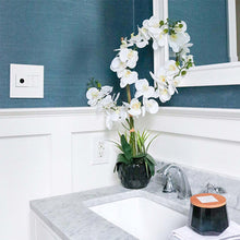 Load image into Gallery viewer, adorne® Wave Switch in bathroom.
