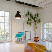 Load image into Gallery viewer, JJ Big Grip LED Wall Light in living room.
