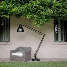 Load image into Gallery viewer, JJ Big LED Outdoor Floor Lamp in Outside Area.
