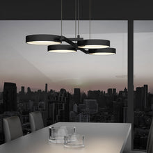 Load image into Gallery viewer, Light Guide Ring 4-Light LED Pendant Light in room.
