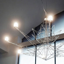 Load image into Gallery viewer, Lightweight Chandelier in dining room.
