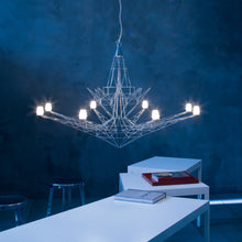 Load image into Gallery viewer, Lightweight Chandelier in dining room.
