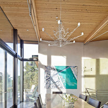 Load image into Gallery viewer, Lightweight Chandelier in dining room.
