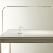 Load image into Gallery viewer, LIM C LED Table Lamp in office.
