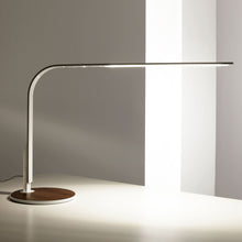 Load image into Gallery viewer, LIM360 LED Table Lamp in office.
