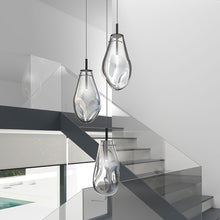 Load image into Gallery viewer, Liquid LED Multi Light Pendant Light in living room.
