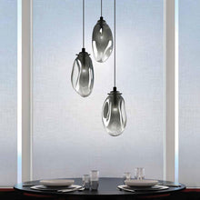 Load image into Gallery viewer, Liquid LED Multi Light Pendant Light in dining room.
