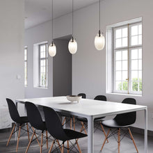 Load image into Gallery viewer, Liquid LED Pendant Light in dining room.
