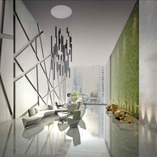 Load image into Gallery viewer, A-Tube LED Pendant Light in living room.
