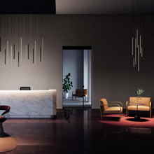 Load image into Gallery viewer, A-Tube Nano LED Pendant Light in lobby.
