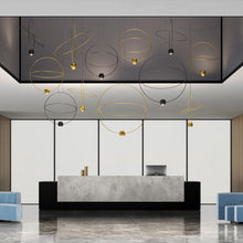 Load image into Gallery viewer, Elara Pendant Light in living room.
