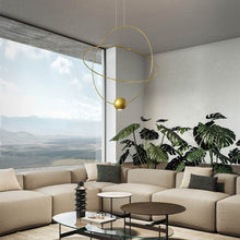 Load image into Gallery viewer, Elara Pendant Light in living room.
