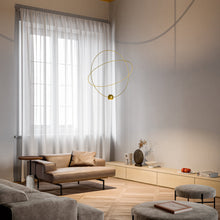 Load image into Gallery viewer, Elara Pendant Light in living room.
