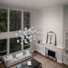 Load image into Gallery viewer, Jefferson Mini LED Pendant Light in living room.
