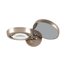 Load image into Gallery viewer, Nautilus LED Wall Light in Champagne.
